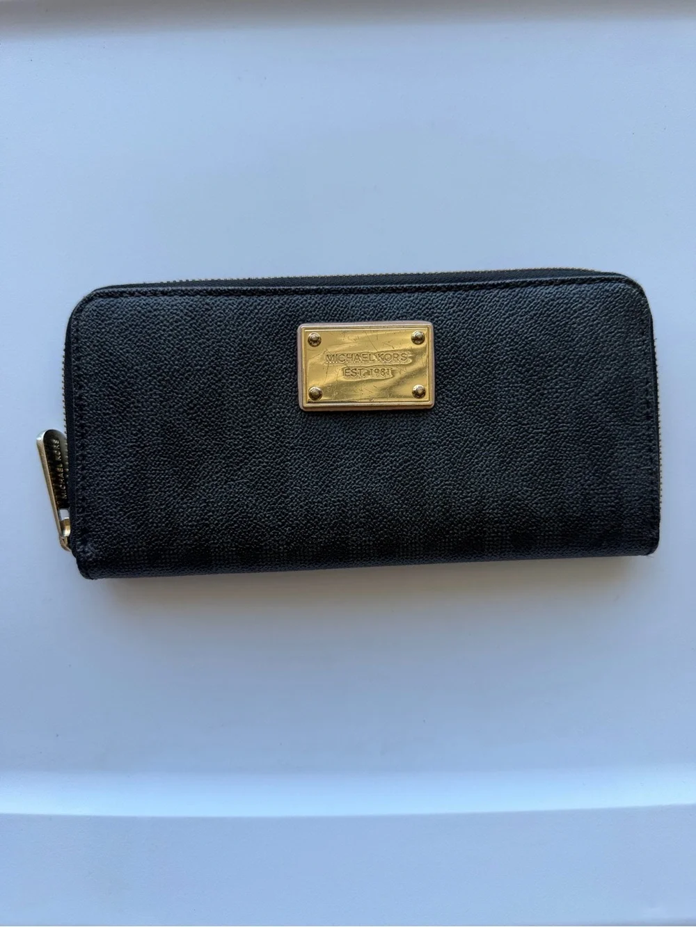 Michael Kors Black Zip Wallet with Gold Plate